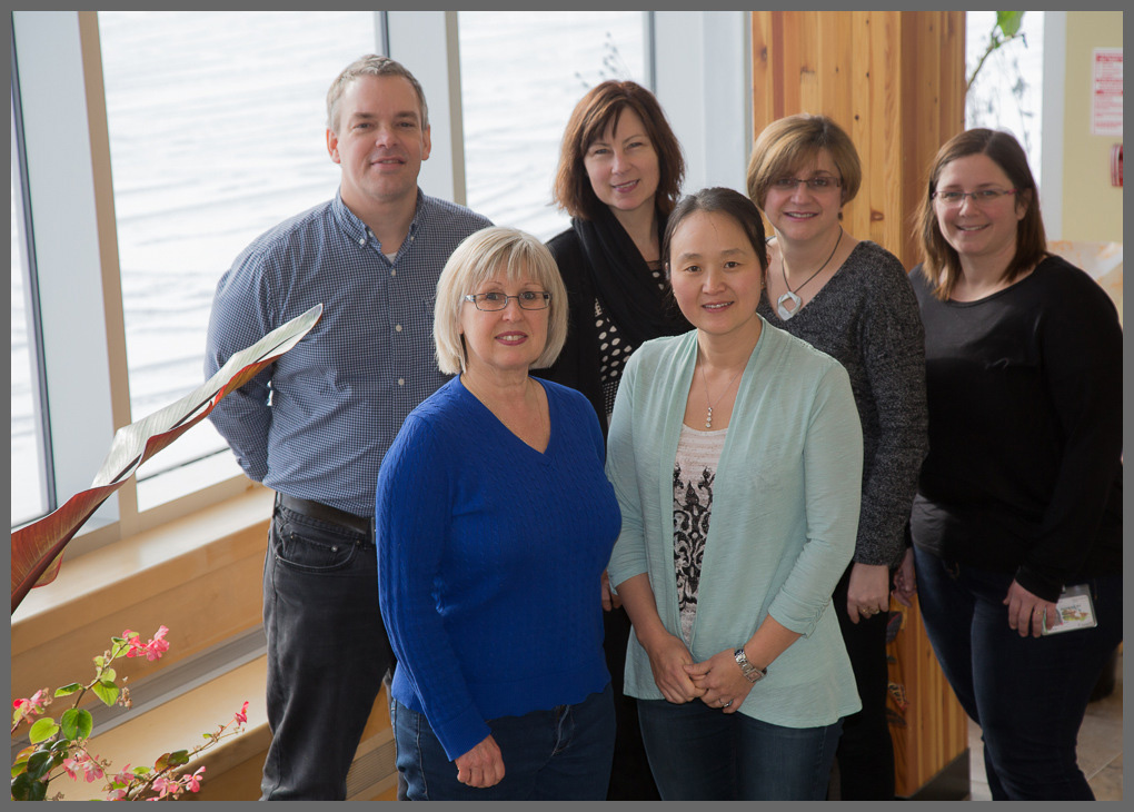 Members of the Doucet laboratory at the great Lakes Forestry Centre: Ms Sharon Hooey, Dr. Fayuan Wen, (front row, L-R). Dr. Daniel Doucet, Ms. Kristine Pinkney, Ms. Lillian Pavlik, Ms. Susan Bowman, (back row, L-R). Photo credit: Mark Primavera.